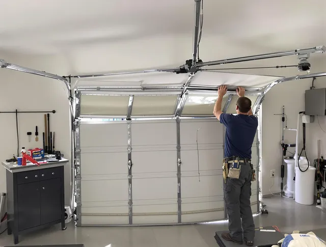La Verne Garage Door Repair specialist performing precise section replacement on La Verne garage door