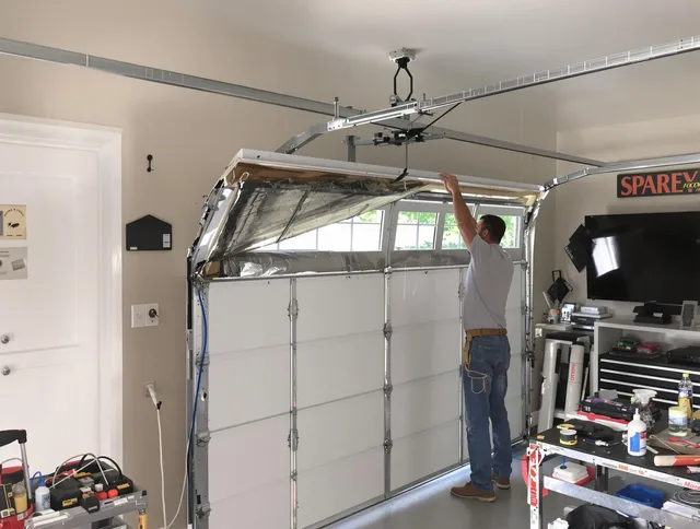 Garage door section replacement by La Verne Garage Door Repair in La Verne