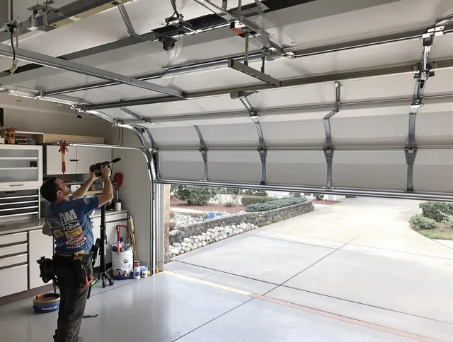 Garage door track repair service by La Verne Garage Door Repair in La Verne